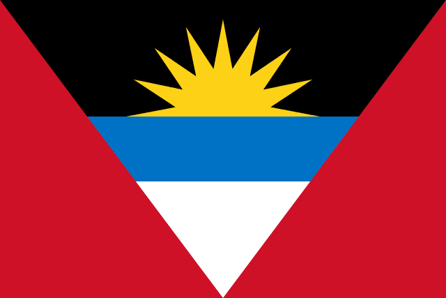Bandera de Antigua y Barbuda: fondo rojo con un triángulo invertido negro, azul y blanco y un sol amarillo naciente